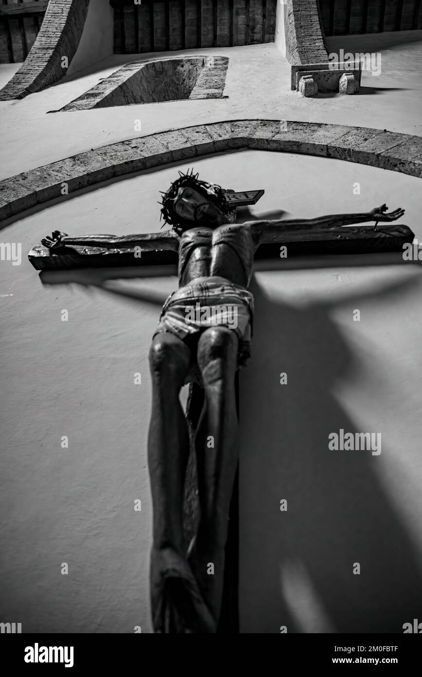 crucifix with jesus placed in church in black and white Stock Photo - Alamy