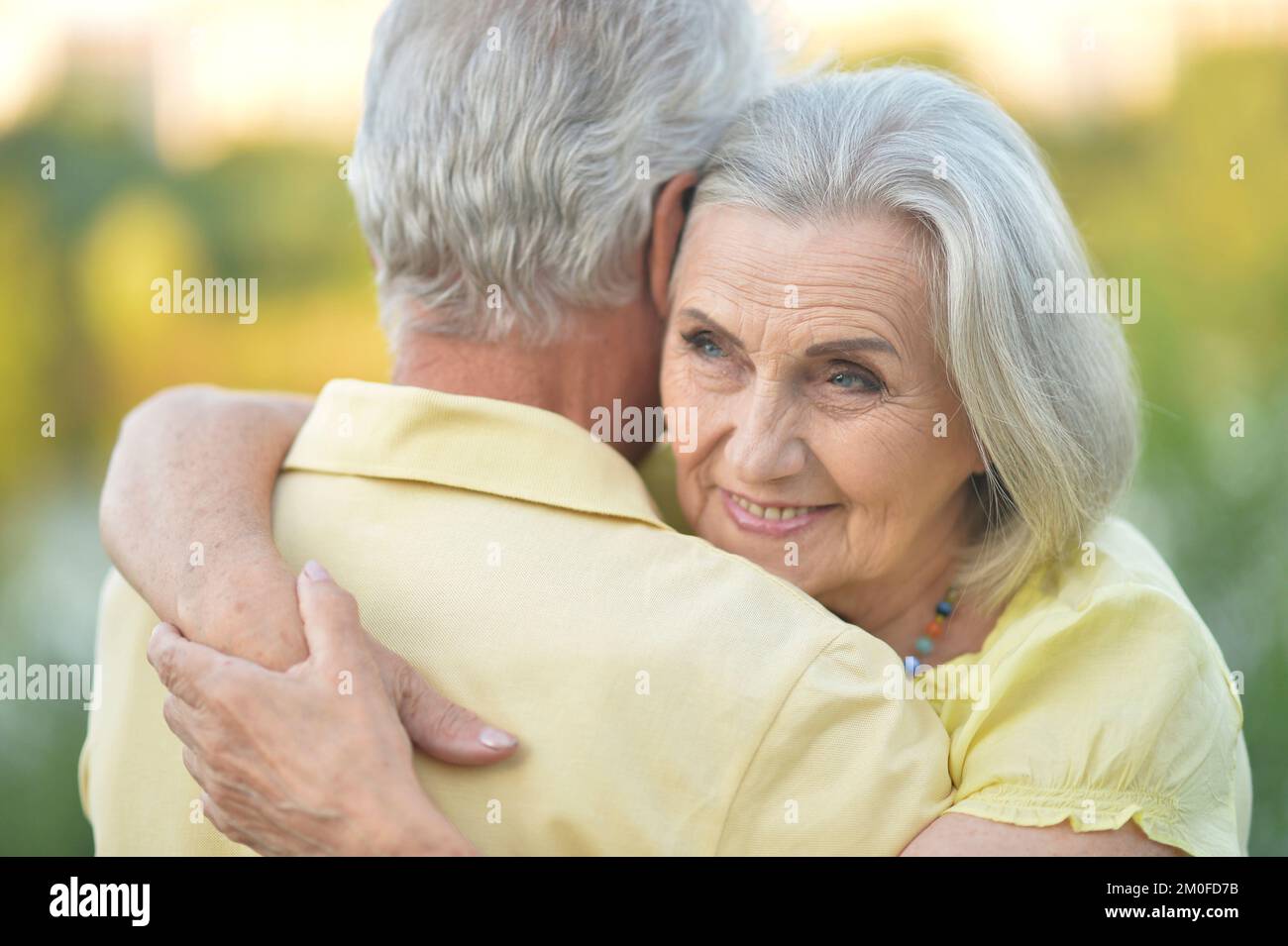 Happy smiling old woman walks hi-res stock photography and images - Alamy