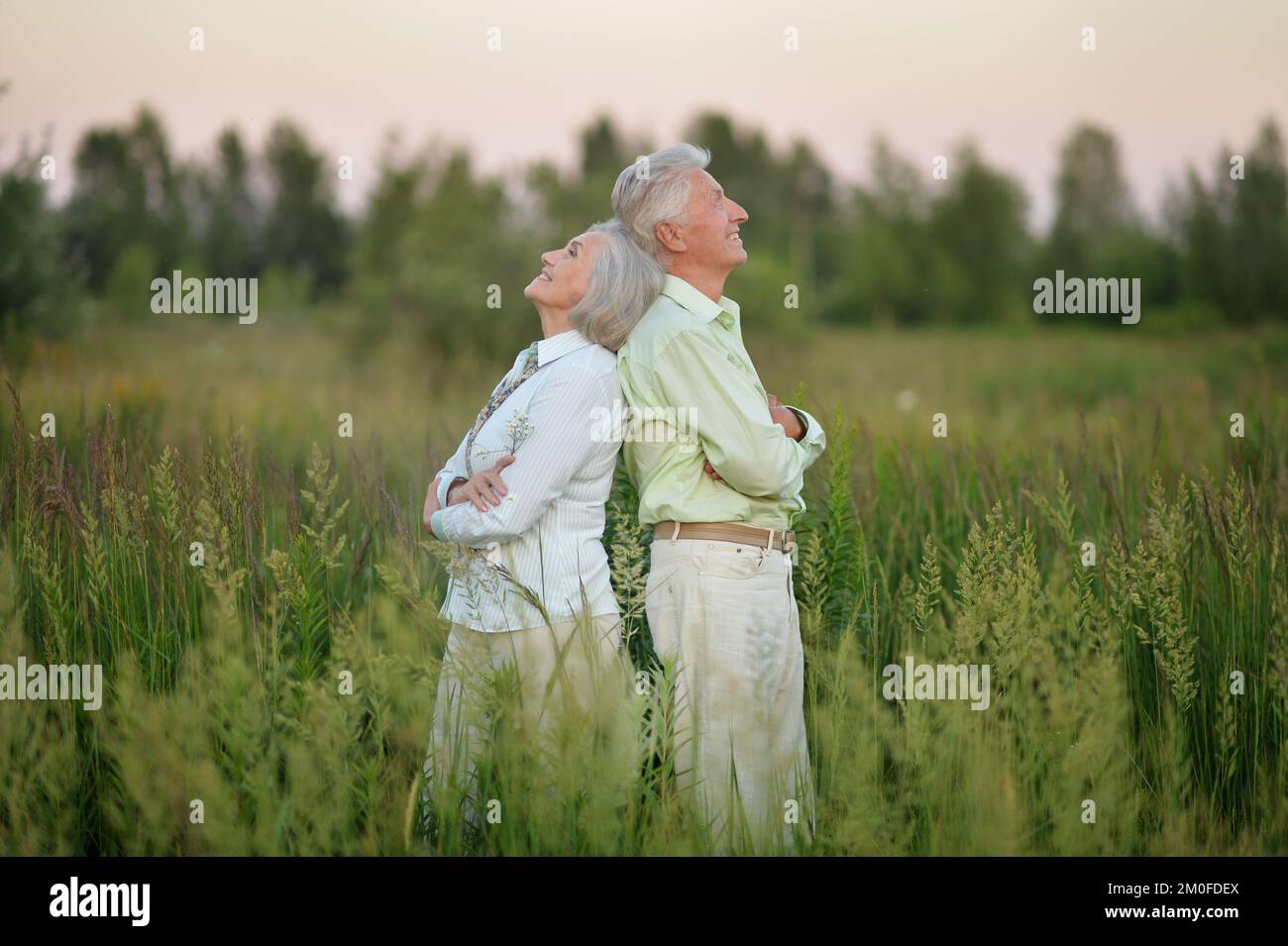Happy smiling old woman walks hi-res stock photography and images - Alamy