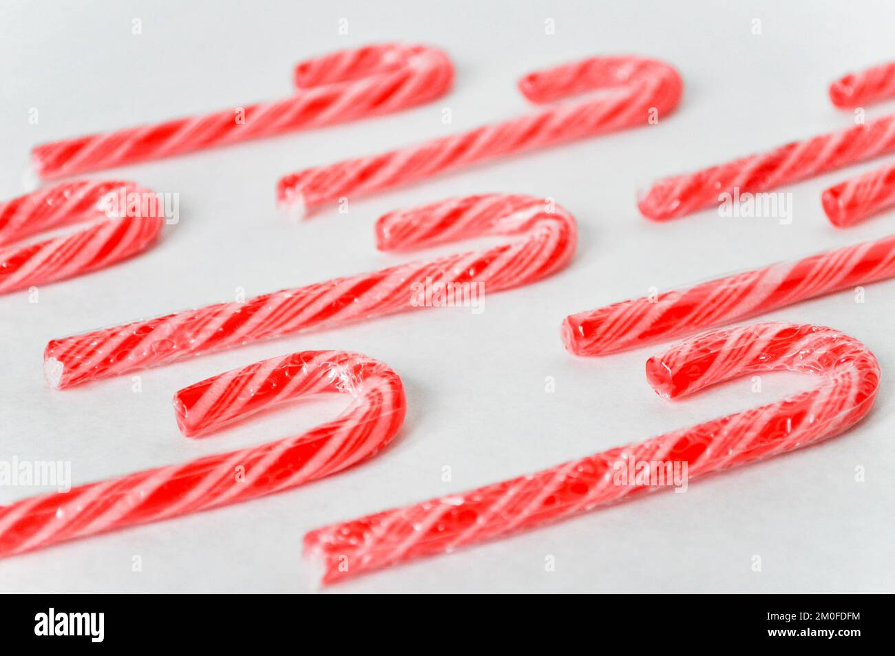 Traditional Christmas candy canes set against a white background Stock Photo Alamy