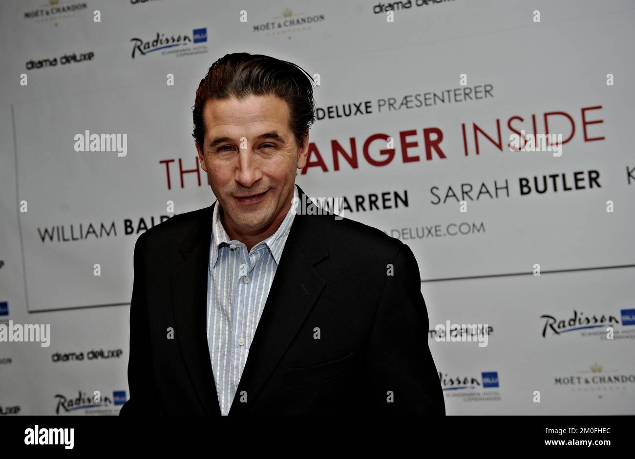 American actor William Baldwin performs in the new Danish thriller 'The Stranger Inside.' The rest of the team consists of Estella Warren, Sarah Butler and Kim bodnia from Denmark. The movie is being shoot in Mallorca and Denmark and is directed and produced by Adam Neutzsky-Wulff and Michael Aoun. The team held a press-meeting in Copenhagen Monday January 9th. In pic. William Baldwin. PHOTOGRAPHER TARIQ MIKKEL KHAN / POLFOTO Stock Photo