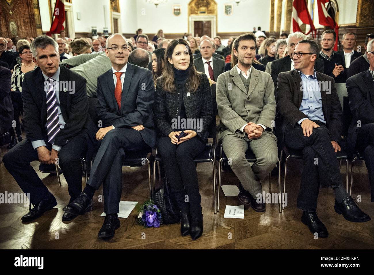 On Monday, October 29, 2012, Crown Princess Mary of Denmark was at theTown Hall in Copenhagen to attend the Christmas Seal Foundation launch of the 2012 Christmas Seal. The money from the sale of Christmas Seal will be donated to four Christmas Seal Homes, which serves as a temporary home for children who need help to break the vicious circle such as obesity or bullying.This yearÂ’s seal was designed by artist, Carl Quist MÃ¸ller, and the seal will be available for purchase on Tuesday, October 30, 2012. (Liv Hybye/POLFOTO) Stock Photo