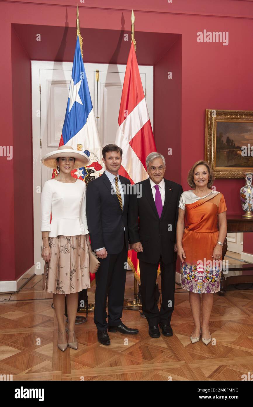 Danish Crown Prince Frederick poses with Chilean Foreign Affairs minister Alfredo Moreno, after being decorated with the Chancellery of Chile's medal of merit, at La Moneda Palace in Santiago, Chile, 11 March 2013. Stock Photo