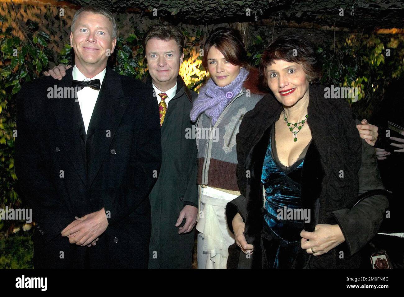 PA PHOTOS / POLFOTO - UK USE ONLY : Danish premiere on 'The Lord of the Rings' in Copenhagen Sunday night. Both royals and celebrities attended the glittering premiere of 'The Lord of The Rings: The Two Towers'. Picture shows super model Helena Christensen with her parents Elsa and Flemming. Far left, Danish millionaire, and businessman Peter Achenfeldt. Stock Photo