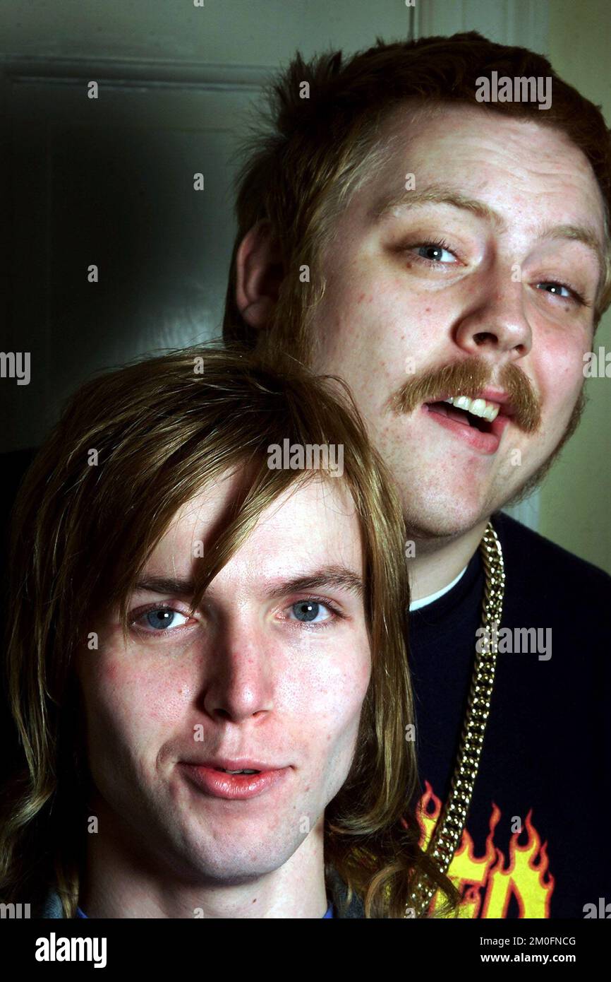 March 29, 2011 - Chicago, Illinois, USA - Groupon fact checker Benno  Nelson, 25, left, talks with reviews researcher Matthew Berns, 26, who is  training to be a fact checker on Groupon's