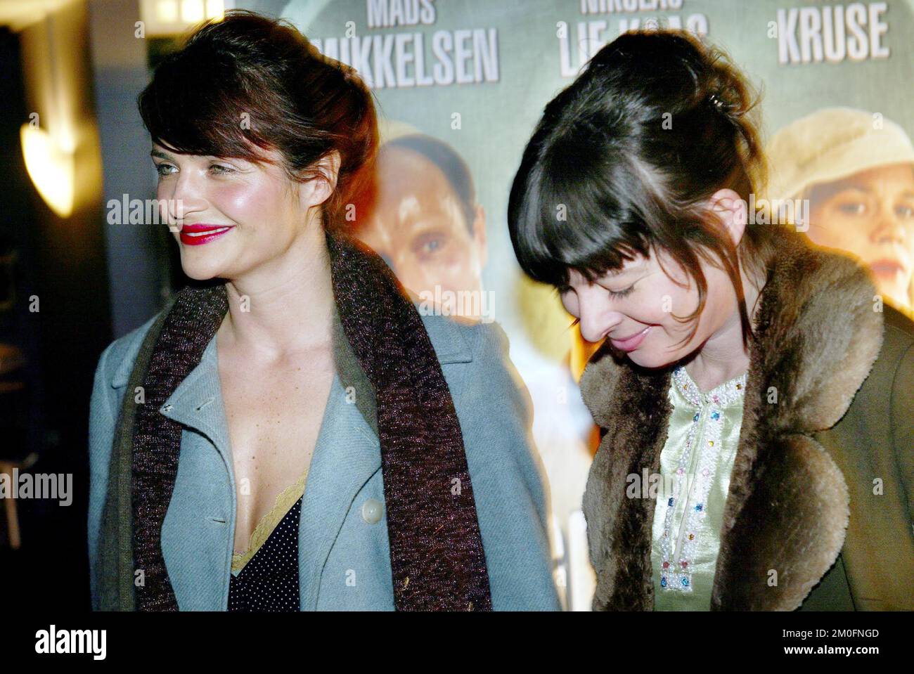 PA PHOTOS/POLFOTO - UK USE ONLY: Danish super model Helena Christensen and her girlfriend attending the movie premiere of the new Danish movie 'De gronne slagtere'. According to rumours she is romantically involved with one the stars from the movie, Nicolaj Lie Kaas. 'No comments, talk to my agent', was the only comment she gave the press. Stock Photo