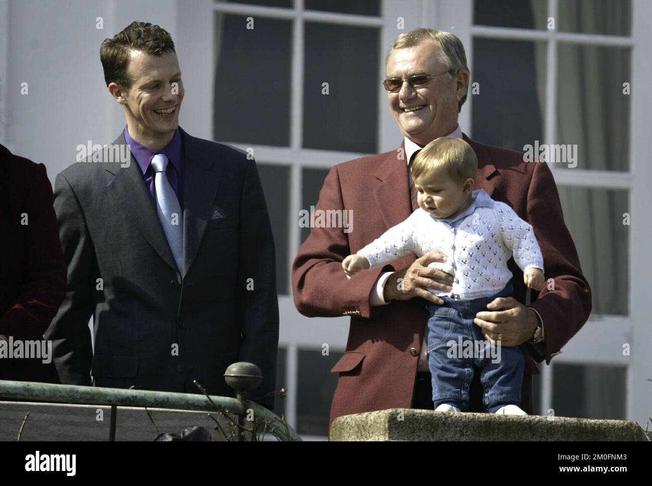 From left Crownprince Frederik and a proud Prince Henrik with Prince