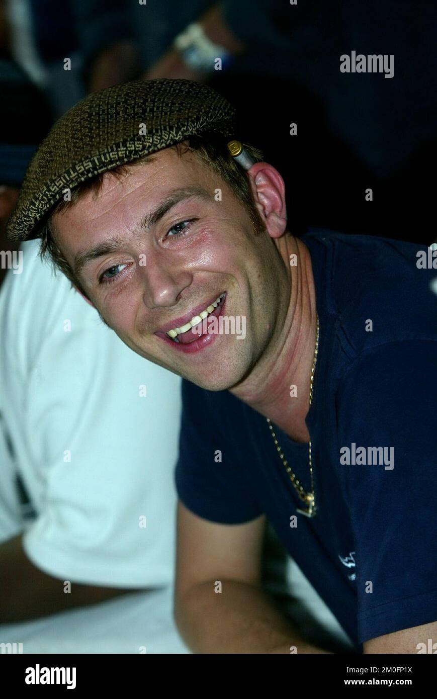 Lead singer of Blur, Damon Albarn with a joint behind his ear during a press meeting at Roskilde Festival. Stock Photo