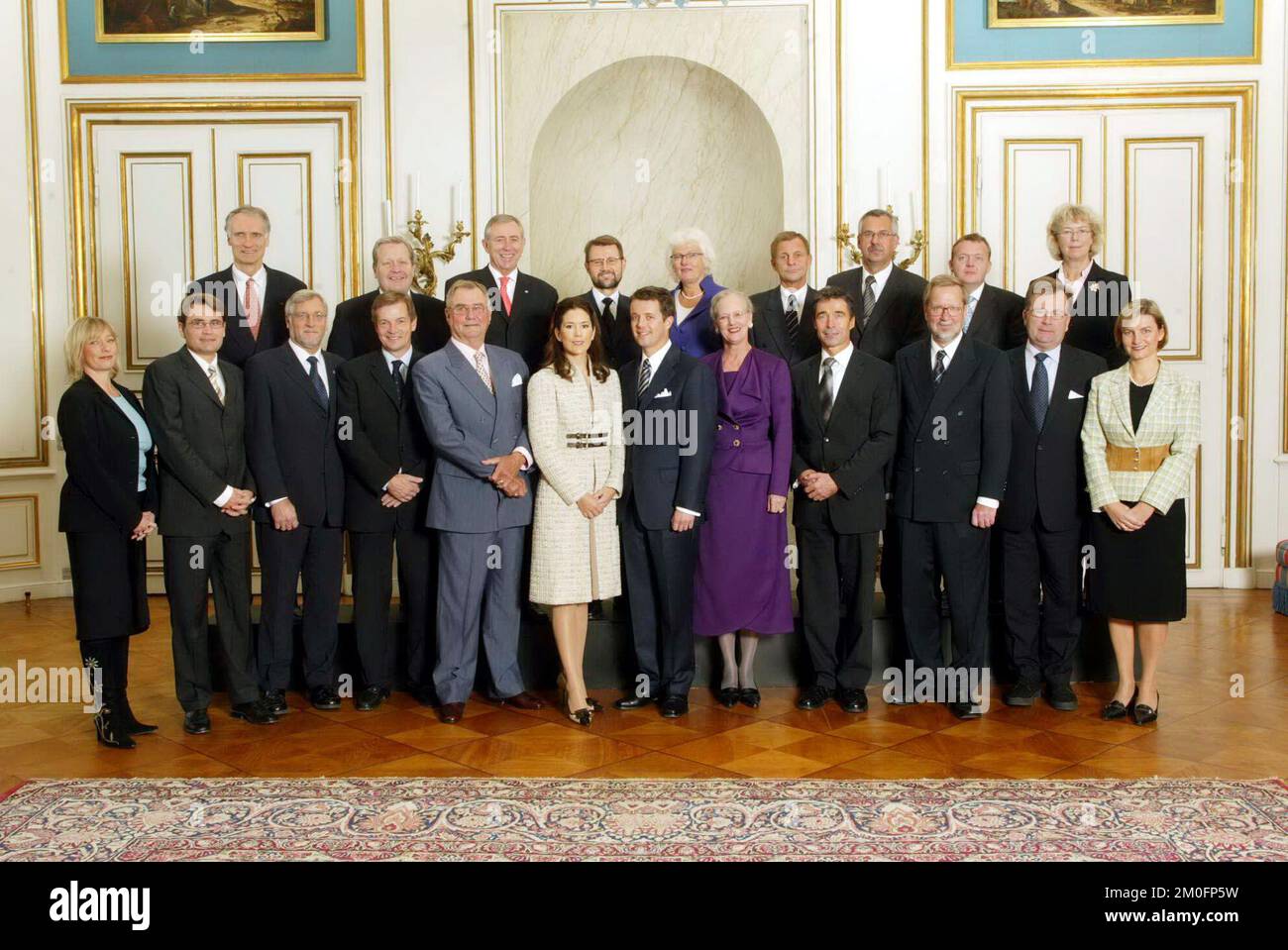 After the meeting of Council of State, the ministers gathered in the Banqueting Hall for the official picture of the royal engagement between HRH crown prince Frederik and Mary Donaldson.  The picture includes Queen Margrethe, Prince Henrik, Frederik and Mary (centre). Stock Photo