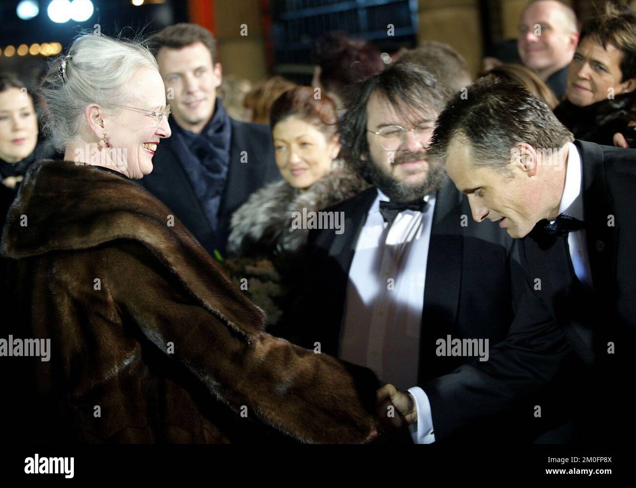 Mary Donaldson, Prince Joachim, Princess Alexandra, Peter Jackson and Viggo Mortensen making a bow for Queen Margrethe during the The Danish premiere of Lord of the Rings: Return of the King. Stock Photo