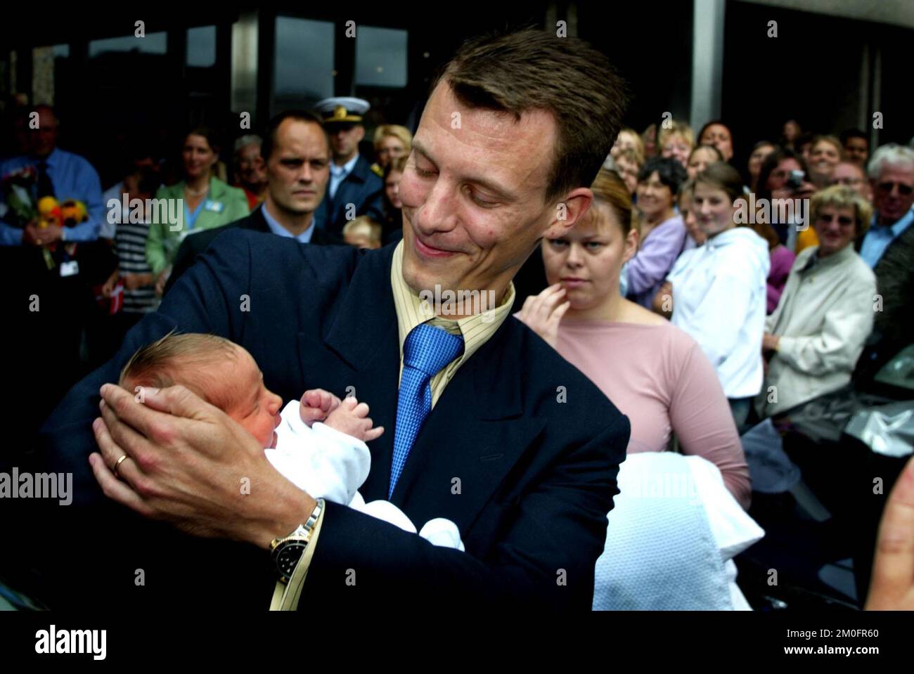 The Danish Prince Joachim with his youngest son, newborn Prince Felix