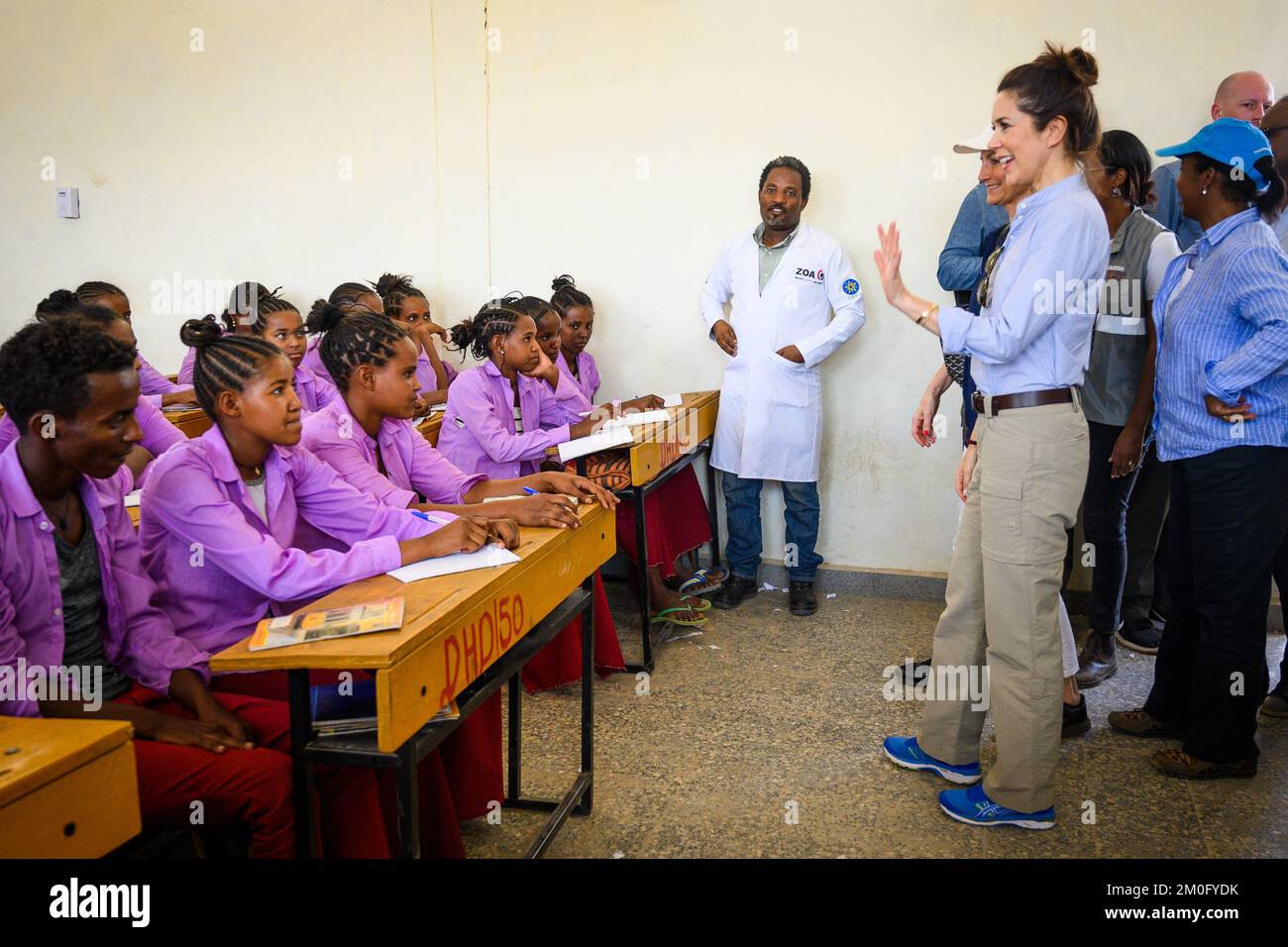 On March 27th 2019 Crown Princess Mary and Minister for Development Ulla Tørnes arrived in Ethiopia on a two day visit to promote equality and gender issues in the country. The second day they spend in the northern town of Shire. Here they were greeted by traditional dancers, visited a refugee camp and a school where they planted trees with the pupils. As a conclusion of the visit they had dinner with the first female President Sahle-Work Zewde. Stock Photo