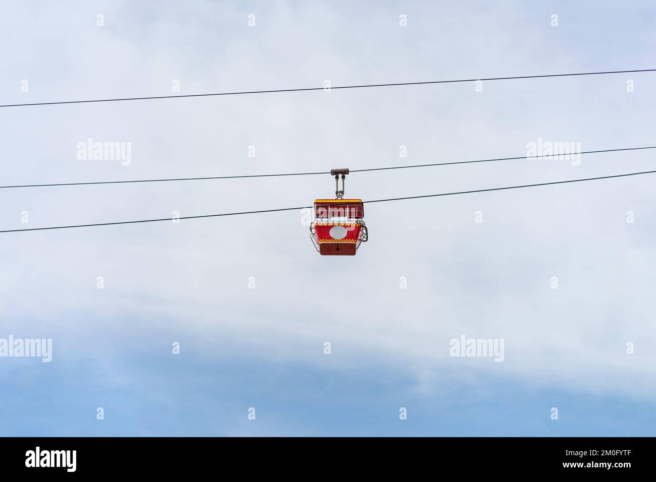 red cable car are floating on a sling for transportation by visitors ...