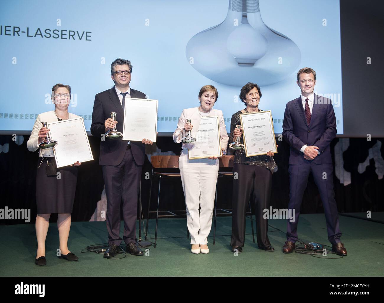 On May 9th 2019 HRH Crown Prince Frederik presented The Brain Prize 2019 at the Danish Royal Library in Copenhagen. The Brain Prize 2019 was awarded to Marie-Germaine Bousser, Hugues Chabriat, Anne Joutel and Elisabeth Tournier-Lasserve. Aiming for treatment they have spent more than 30 years describing, understanding and diagnosing the most common inherited form of stroke, CADASIL. Stock Photo