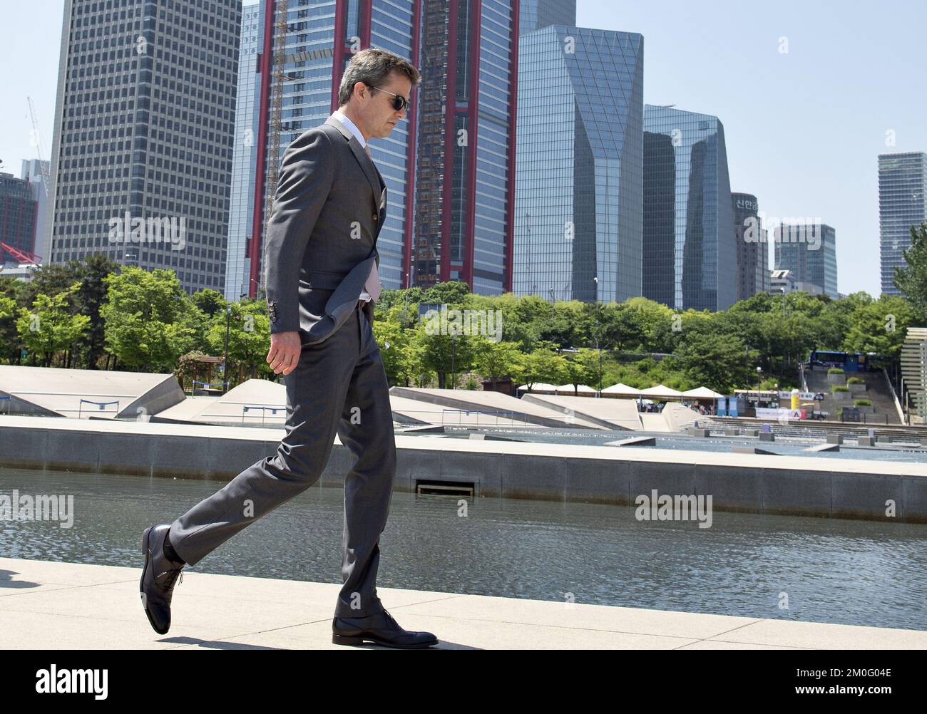 The Crown Prince Couple spent their last day in South Korea where they have been part of a business exposition tour promoting a stronger relationship between Denmark and South Korea. Here Crown Prince Frederik visited the river in Seoul where a replica of the Danish landmark The Little Mermaid has its place. The sculpture was a gift from the Danish State for their 2014 visit. He also visited the world's 5th highest building Lotte World Tower where he looked out over the city from the 555 meter high observation deck. Stock Photo