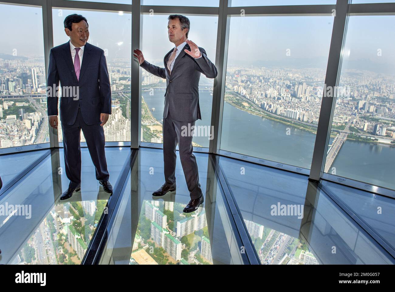 The Crown Prince Couple spent their last day in South Korea where they have been part of a business exposition tour promoting a stronger relationship between Denmark and South Korea. Here Crown Prince Frederik visited the river in Seoul where a replica of the Danish landmark The Little Mermaid has its place. The sculpture was a gift from the Danish State for their 2014 visit. He also visited the world's 5th highest building Lotte World Tower where he looked out over the city from the 555 meter high observation deck. Stock Photo