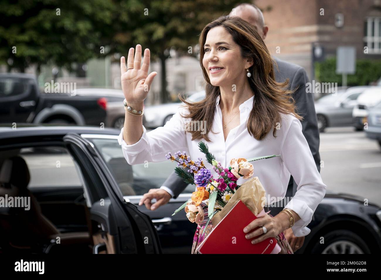Crown Princess Mary received a bouquet made of LEGO in when she attended Creative Denmark's launch event 'Creative Summit' at Industriens Hus in Copenhagen. Wednesday, June 23, 2021. Dansk Industri (The Confederation of Danish Industry) and Creative Denmark want to create a platform that focuses on the growth potential in the creative industries, while at the same time facilitating knowledge and networking opportunities where creative actors can be inspired by each other's business areas and models. With her participation, Crown Princess Mary helped focus attention on talented Danish creative Stock Photo