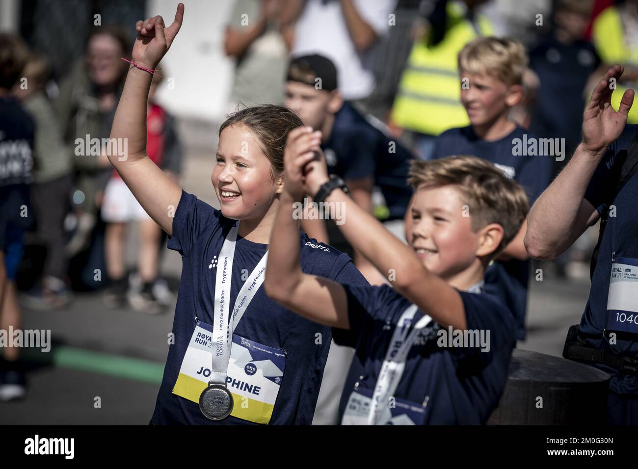 Princess Josephine and Prince Vincent cheering on other runners after reaching the finish line during the one-mile race at Royal Run 2021 in Copenhagen. Sunday, September 12, 2021. (Photo: Mads Claus Rasmussen/Ritzau Scanpix) Stock Photo