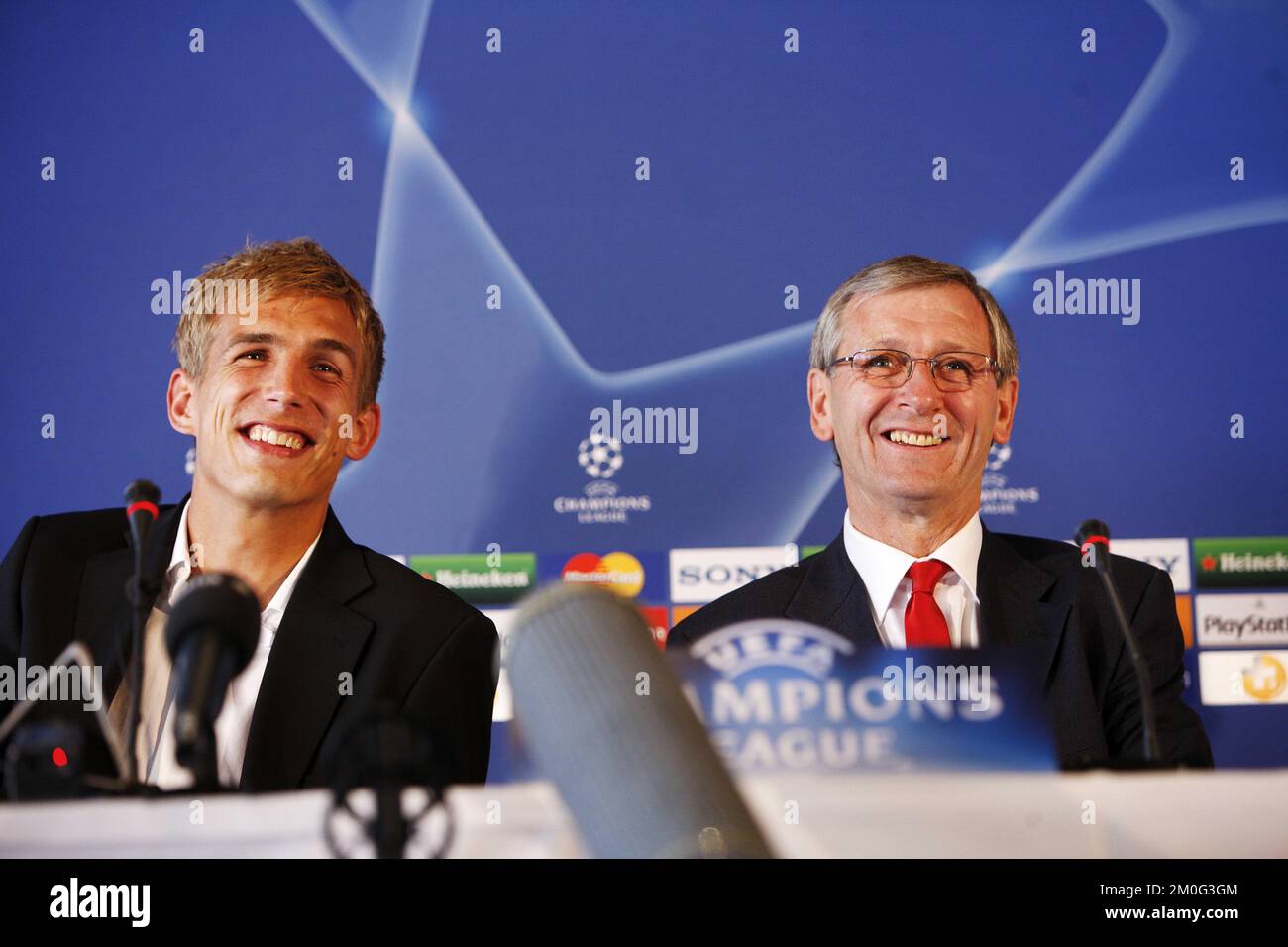 AaB team captain Thomas Augustinussen, left, and coach Bruce Rioch, right, listened to questions during a press meeting Monday Sept. 29, 2008 in Aalborg, Denmark, before the Champions League match between Manchester United and Danish team AaB Tuesday in Aalborg. (AP Photo/POLFOTO, Mick Anderson) ** DENMARK OUT ** Stock Photo