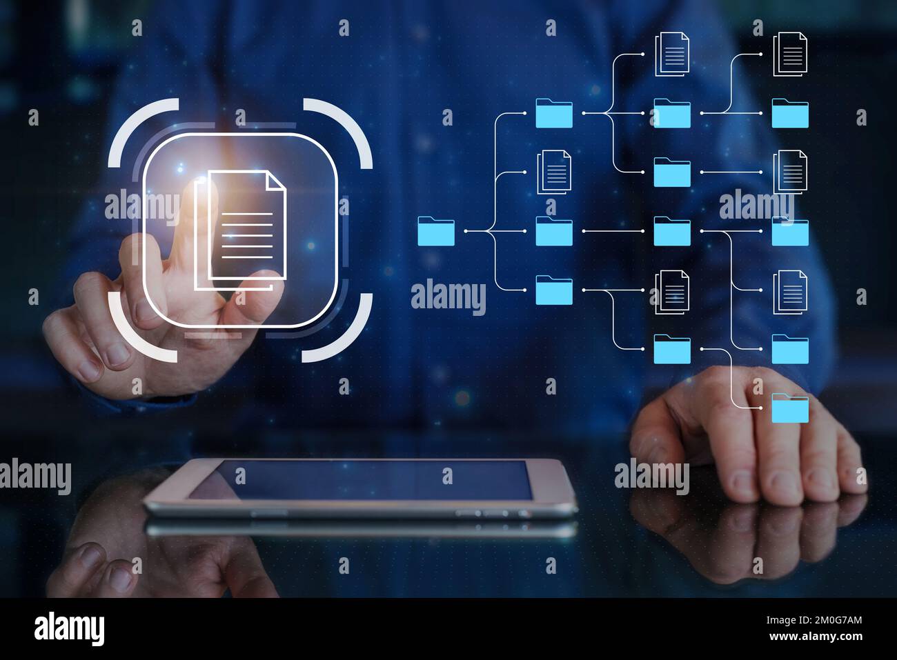 Document management system (DMS) and business process automation technology being setup by IT consultant working on digital tablet computer. Online fi Stock Photo