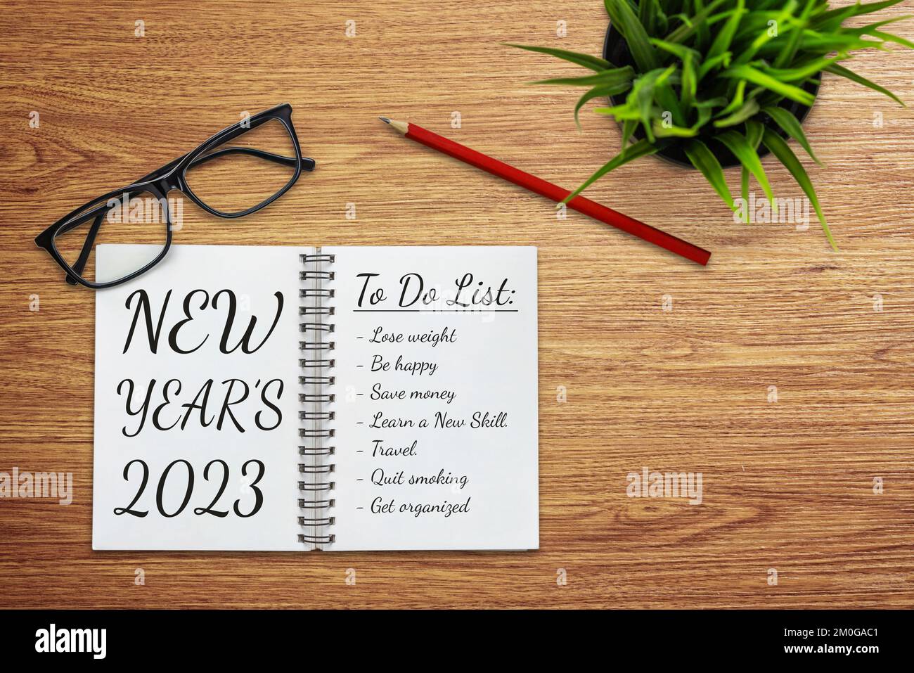 2023 Happy New Year Resolution Goal List and Plans Setting - Business office desk with notebook written about plan listing of new year goals and Stock Photo