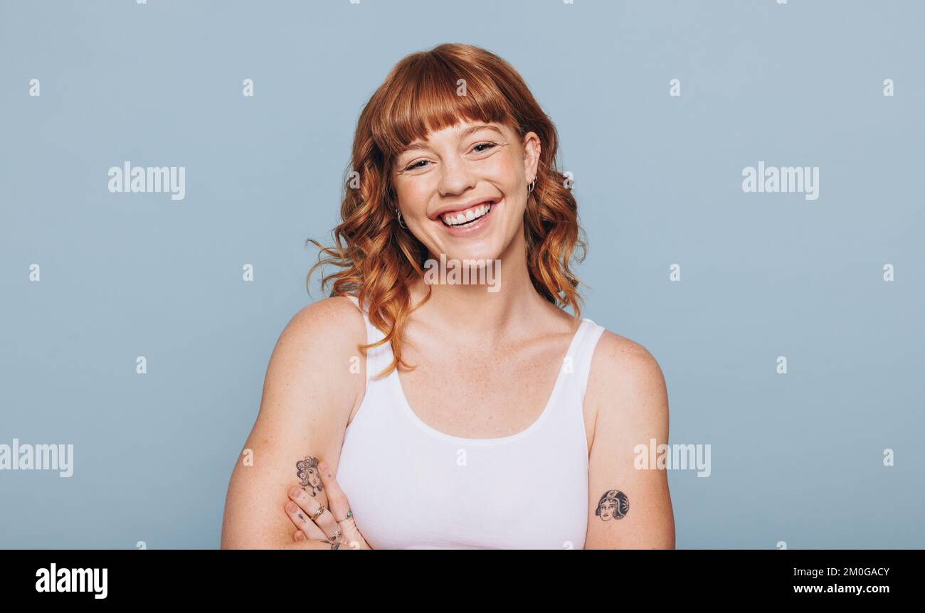 Woman in white tank top hi-res stock photography and images - Alamy