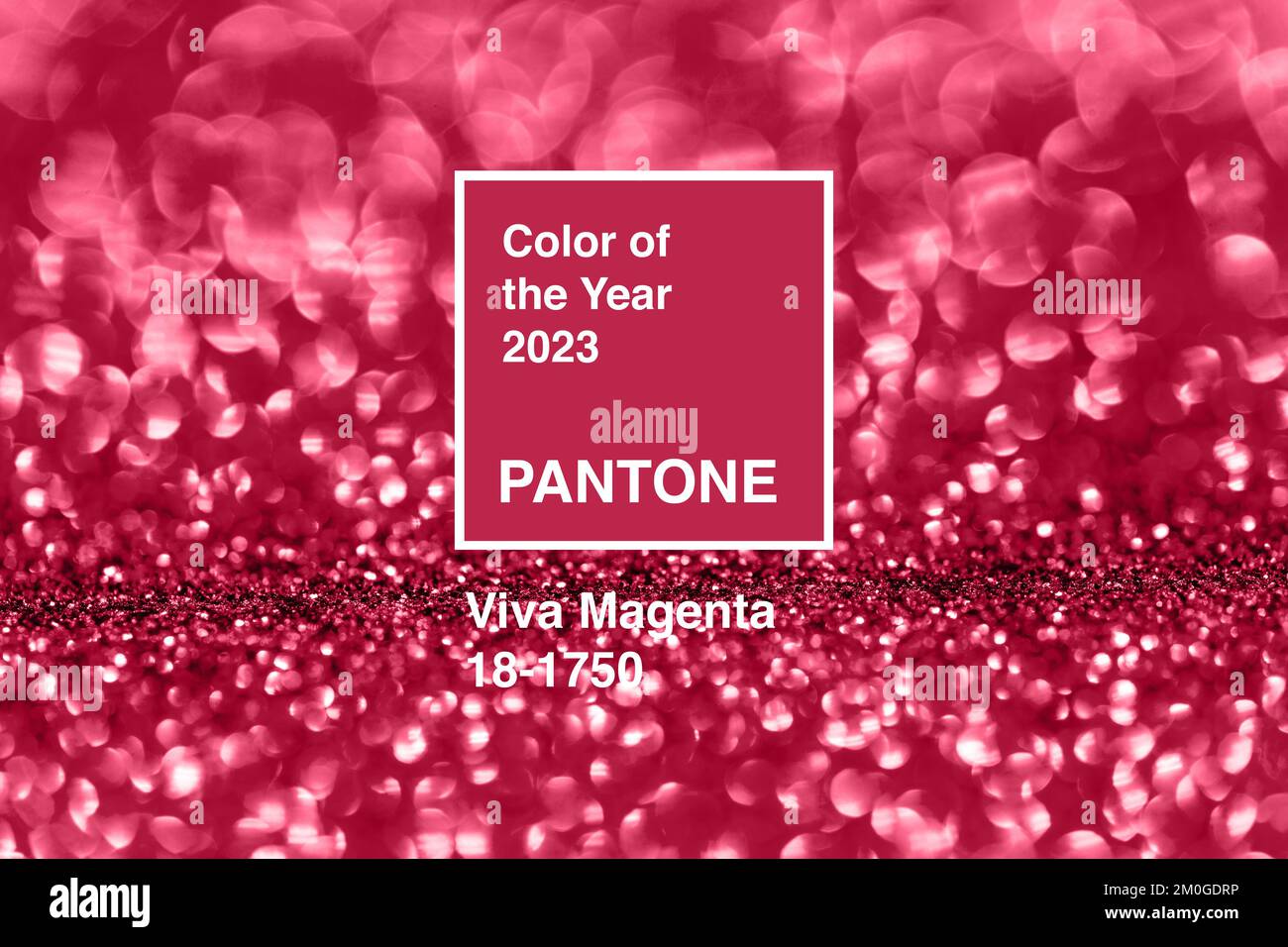 Dnipro, Ukraine - 01, February 2021 : Viva Magenta background with blurry sparkles. Pantone Color of The Year 2023.  Stock Photo
