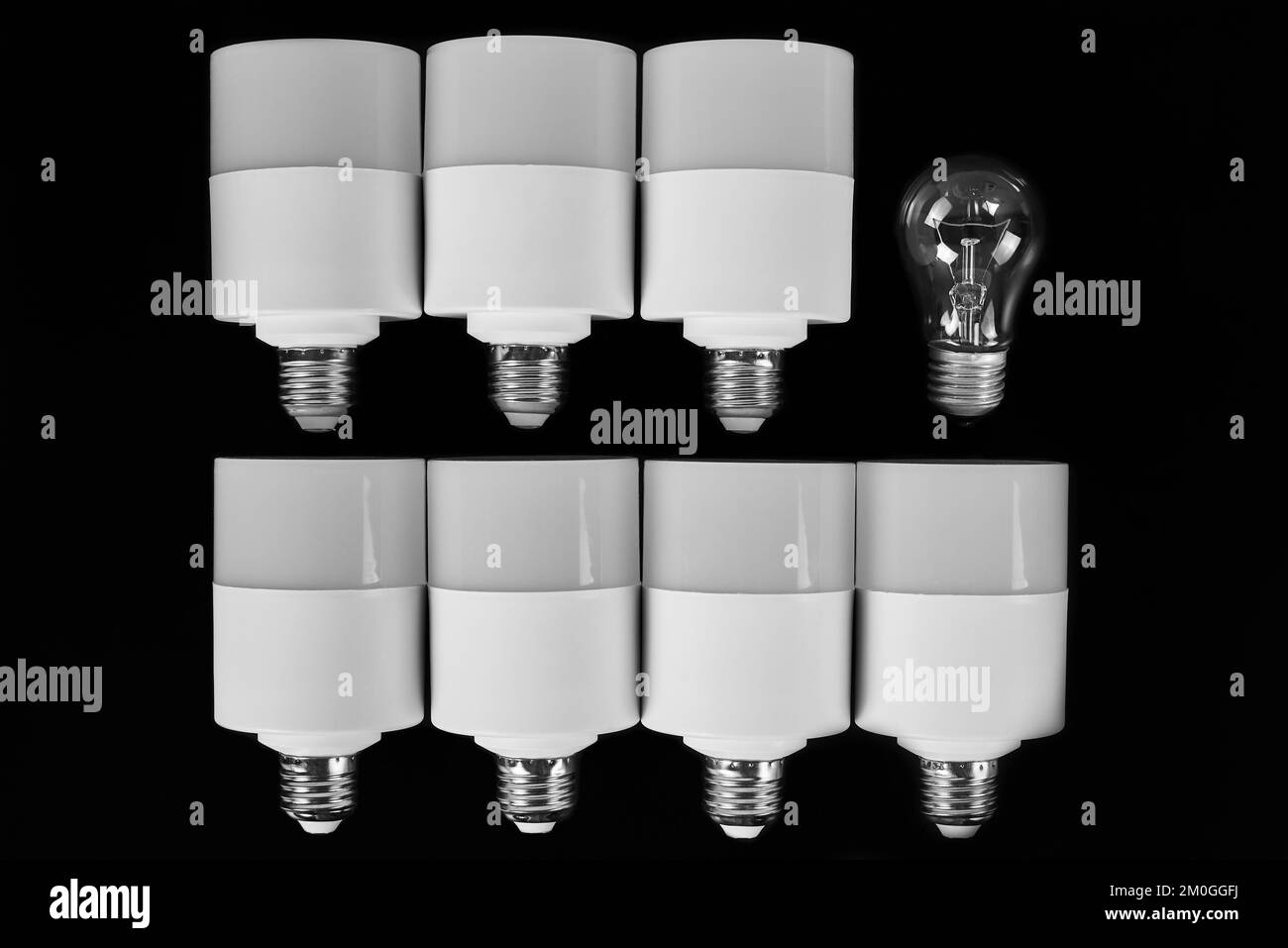 LED lamps and an incandescent lamp on a dark background Stock Photo Alamy