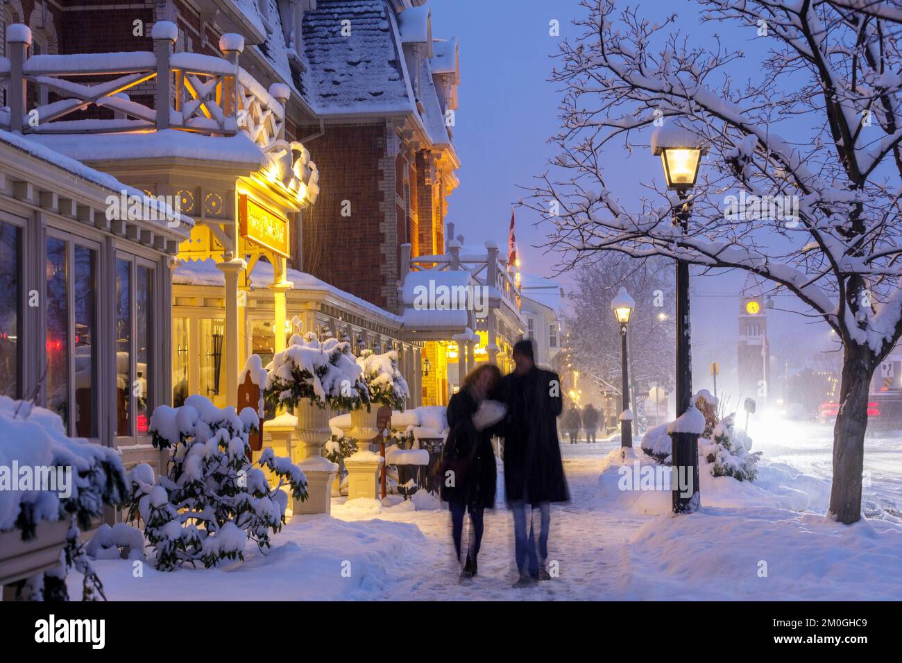 Canada, Ontario, Niagara-on-the-Lake, winter scene on Queen Street and the Prince of Wales Hotel on a snowy evening Stock Photo