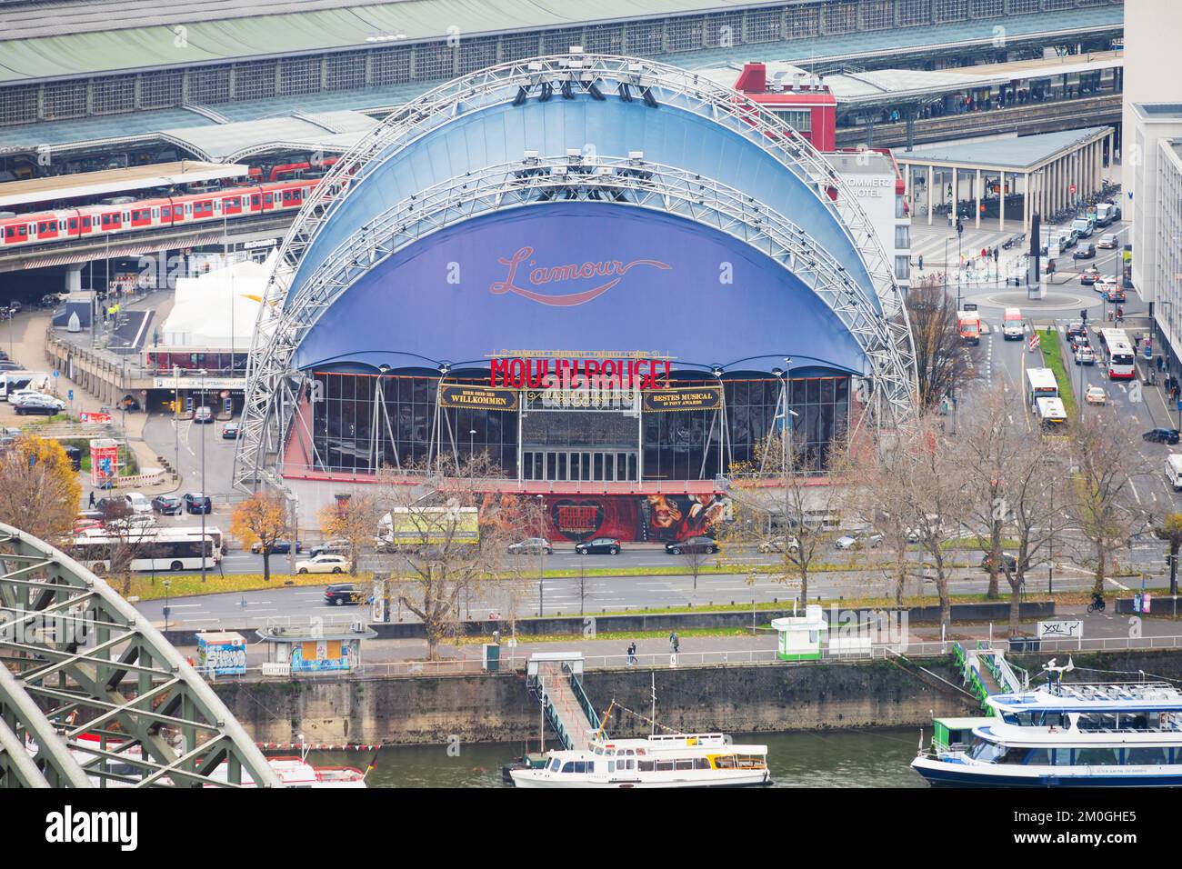 Musical Dome concert venue showing Moulin Rouge on the bank of the River Rhine. Koln Cologne, North Rhine Westfalia, West Germany Stock Photo