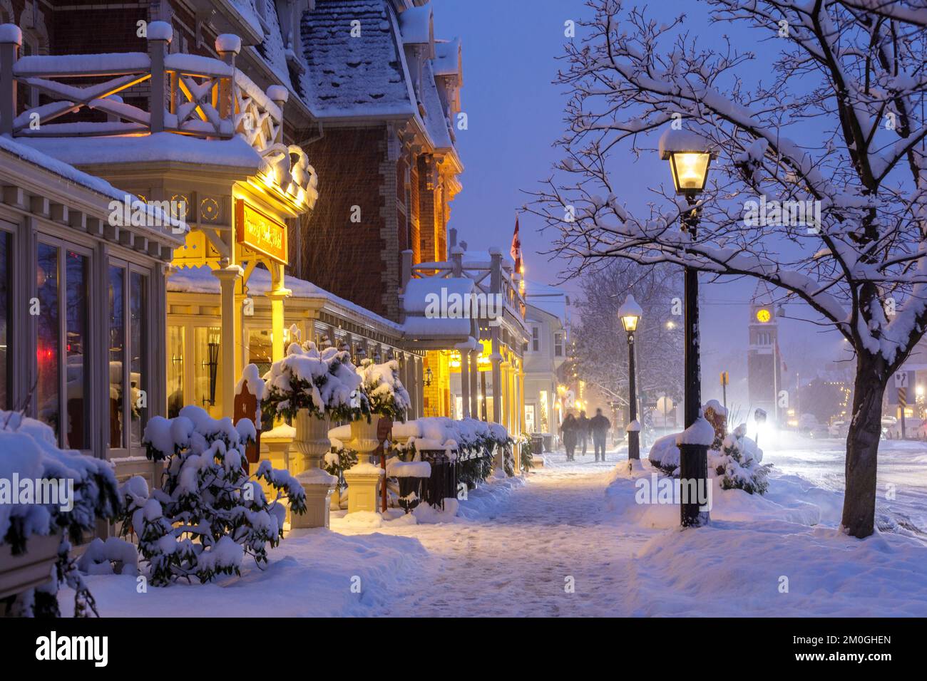 Canada, Ontario, Niagara-on-the-Lake, winter scene on Queen Street and the Prince of Wales Hotel on a snowy evening Stock Photo