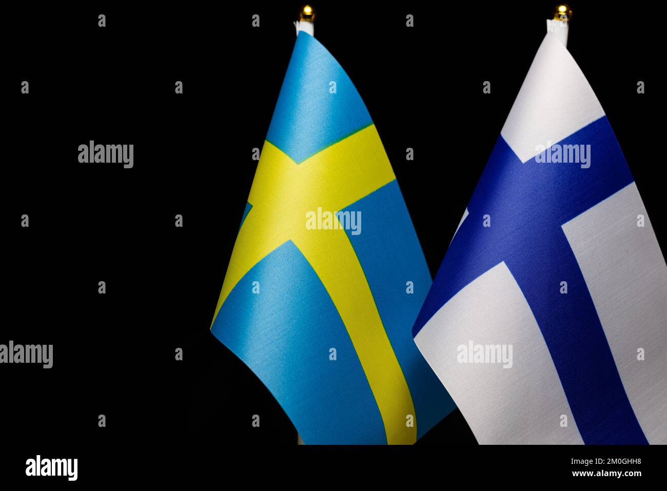 Flags of Sweden and Finland, close together, concept of state relations Stock Photo