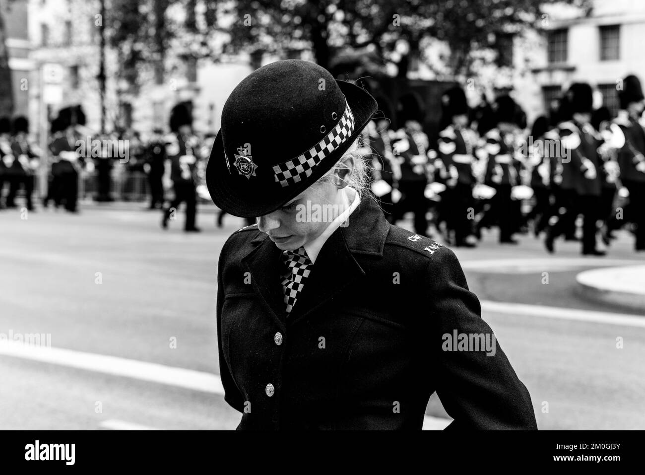 Caucasian woman a female london bobby or bobbie or policewoman Black