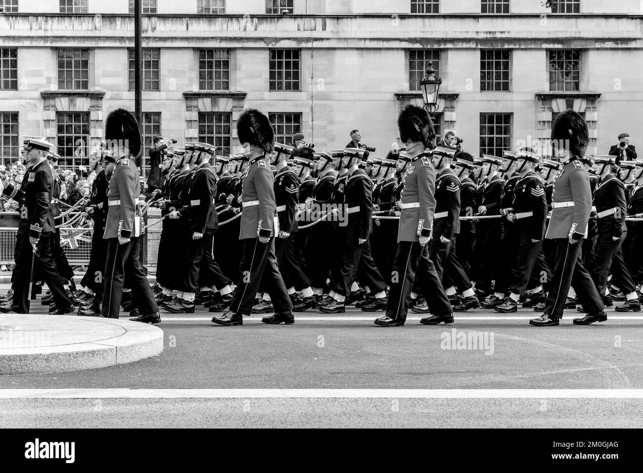 Naval Ratings (Accompanied By Grenadier Guards) Pull The State Gun Carriage and Coffin As Part Of The Funeral Procession Of Queen Elizabeth II, Whiteh Stock Photo