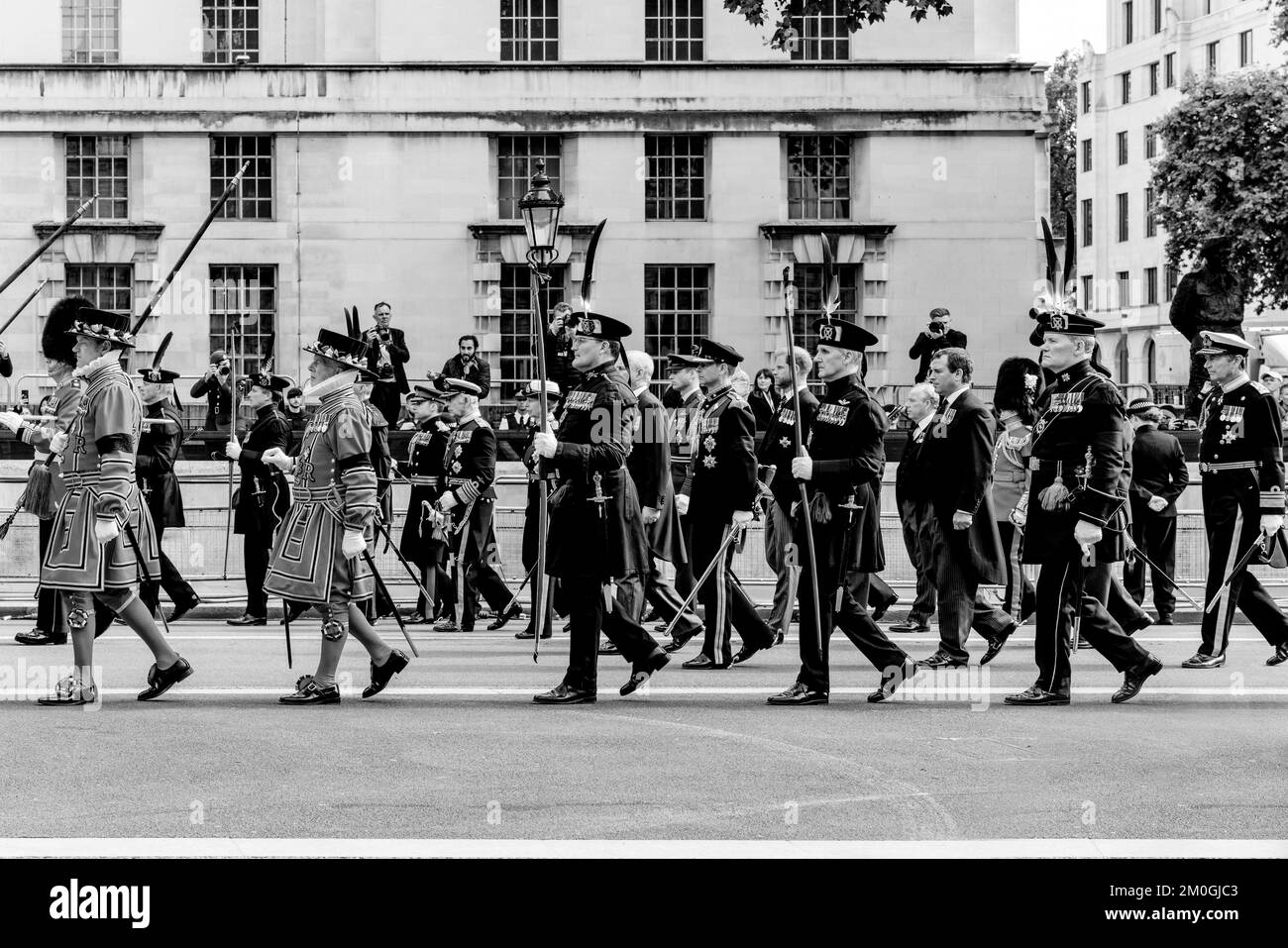 Members Of The British Royal Family Walk Behind The Coffin Of Queen Elizabeth II As The Funeral Procession Travels Up Whitehall, London, UK. Stock Photo