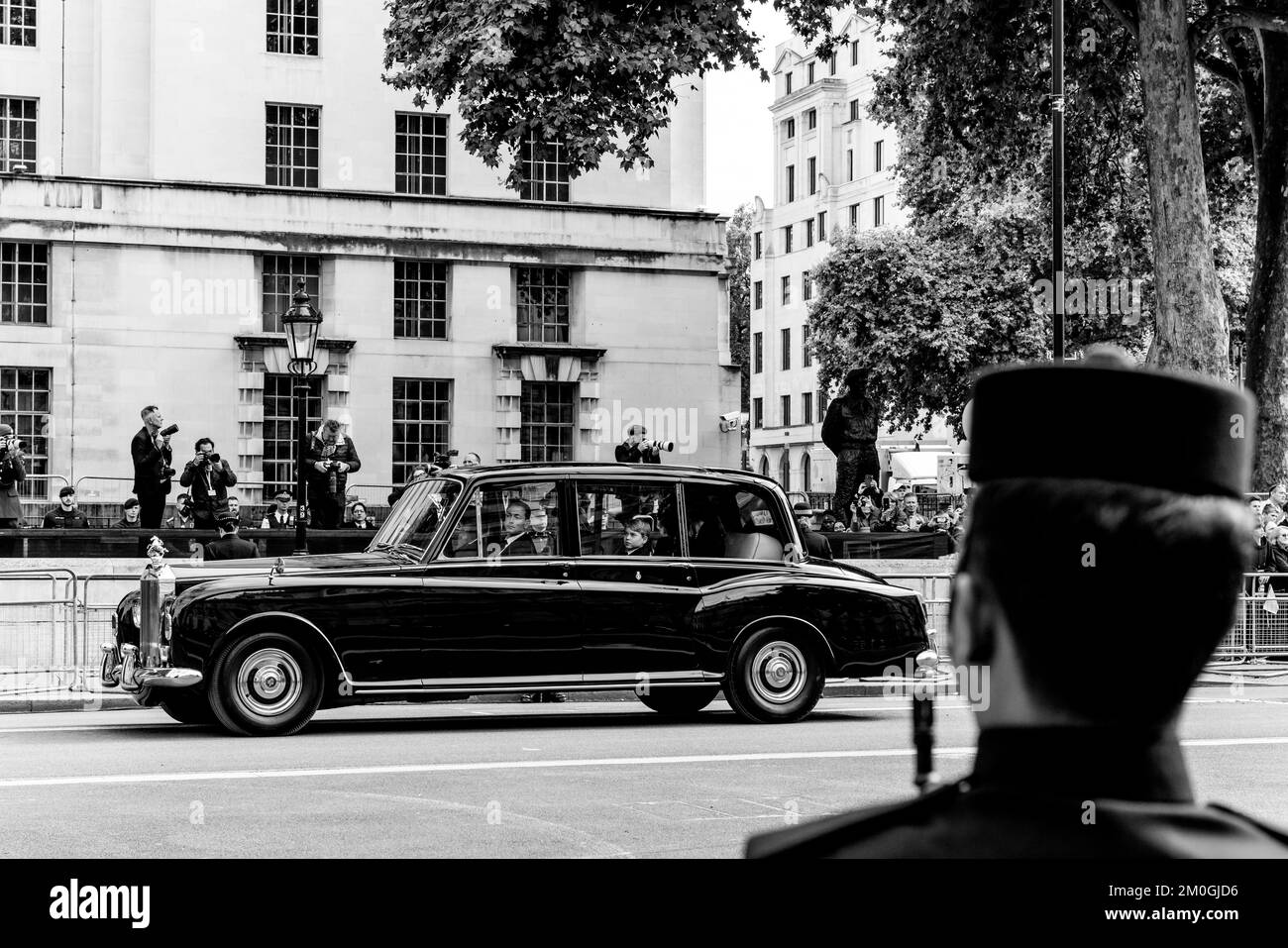 The Royal Car With The Princess of Wales, The Queen Consort and Prince George Follows The Coffin Of Queen Elizabeth II As The Funeral Procession Trave Stock Photo