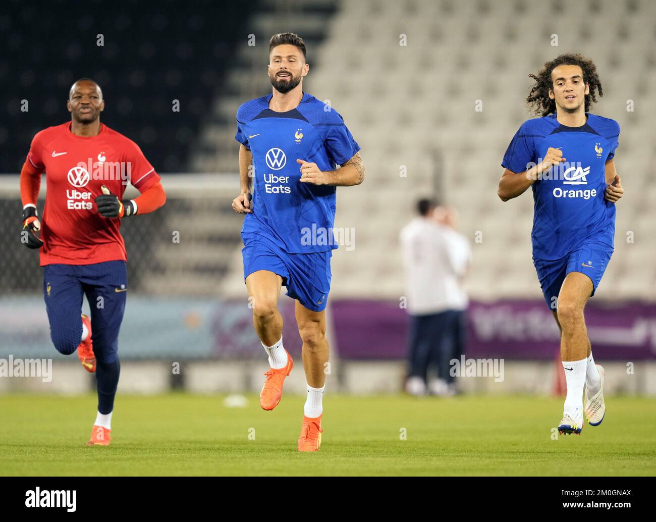 France's (left-right) goalkeeper Steve Mandanda, Olivier Giroud and Matteo Guendouzi during a training session at the Al Sadd Sports Club in Doha, Qatar. Picture date: Tuesday December 6, 2022. Stock Photo