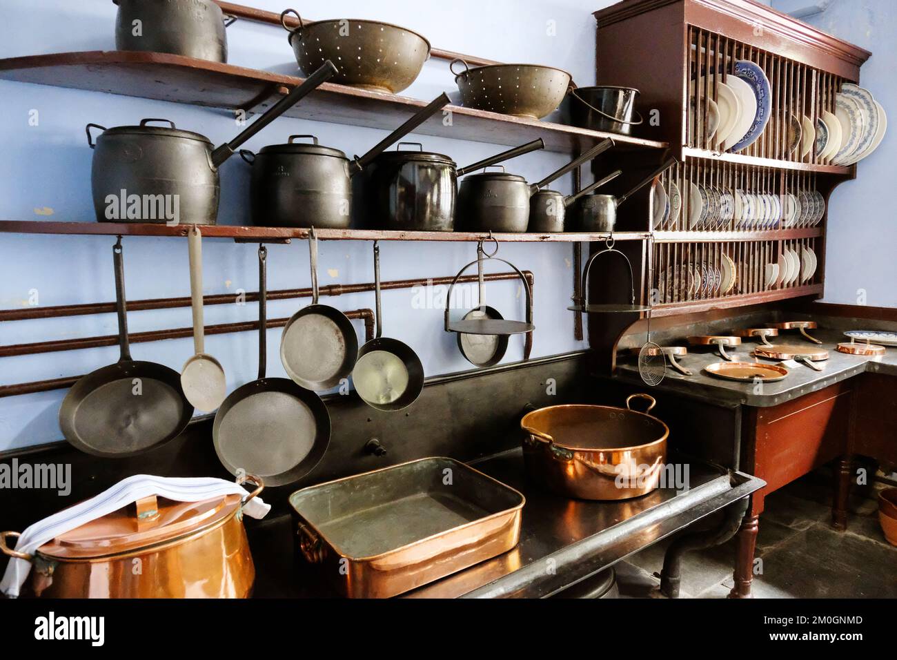 Old fashioned copper pots and pans John Gollop Stock Photo Alamy