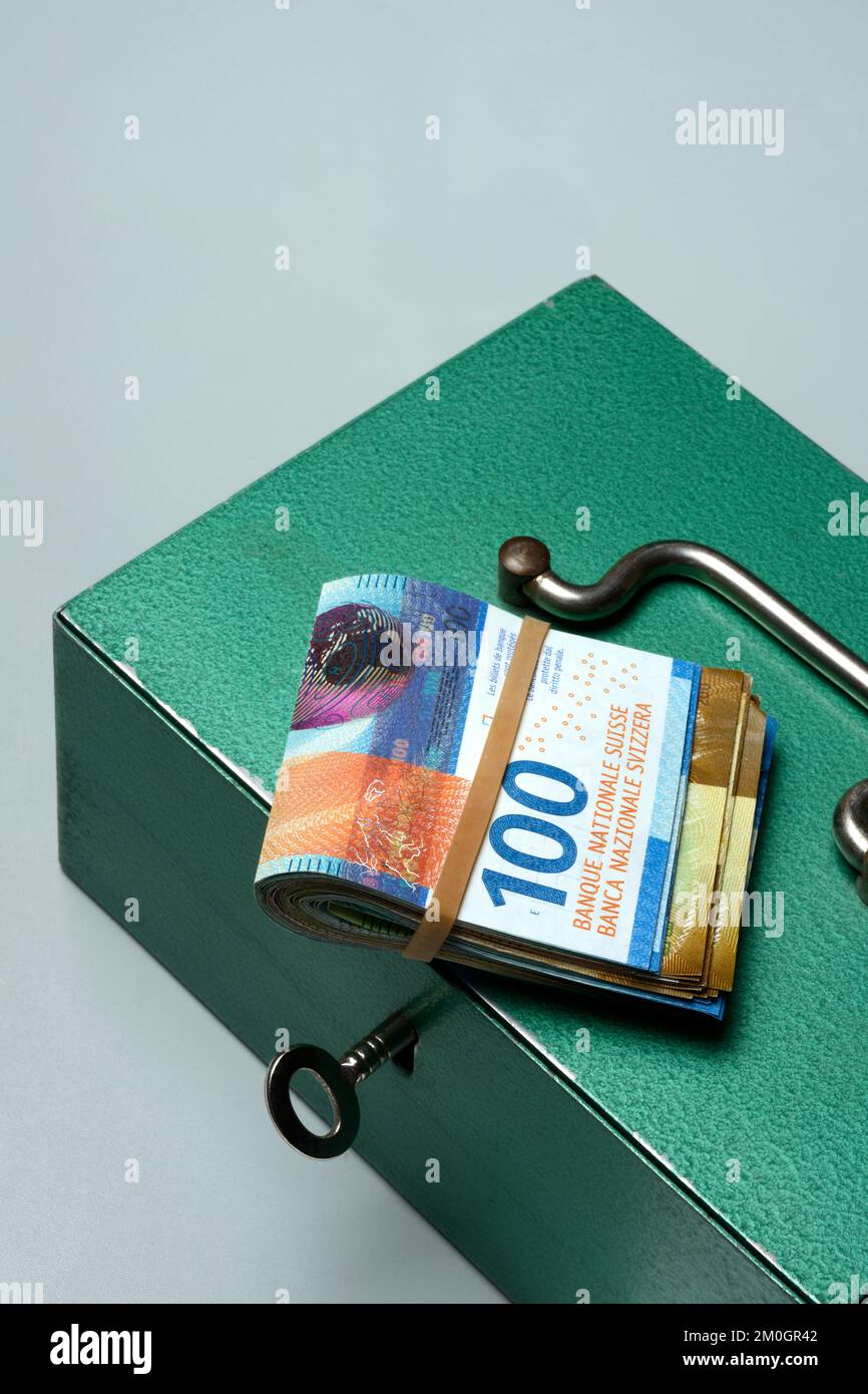 Cash box and Swiss banknotes, money, banknotes Stock Photo