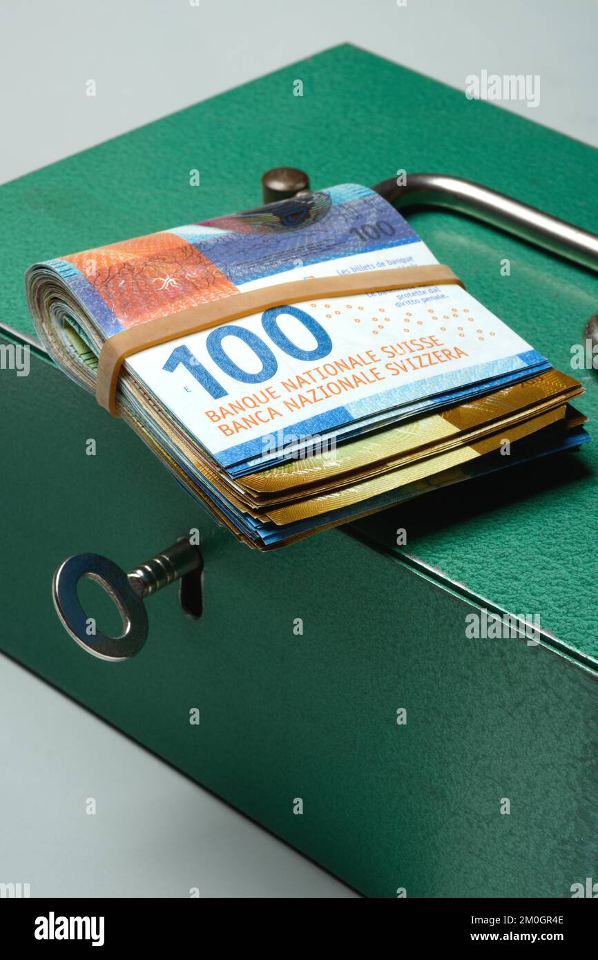 Cash box and Swiss banknotes, money, banknotes Stock Photo