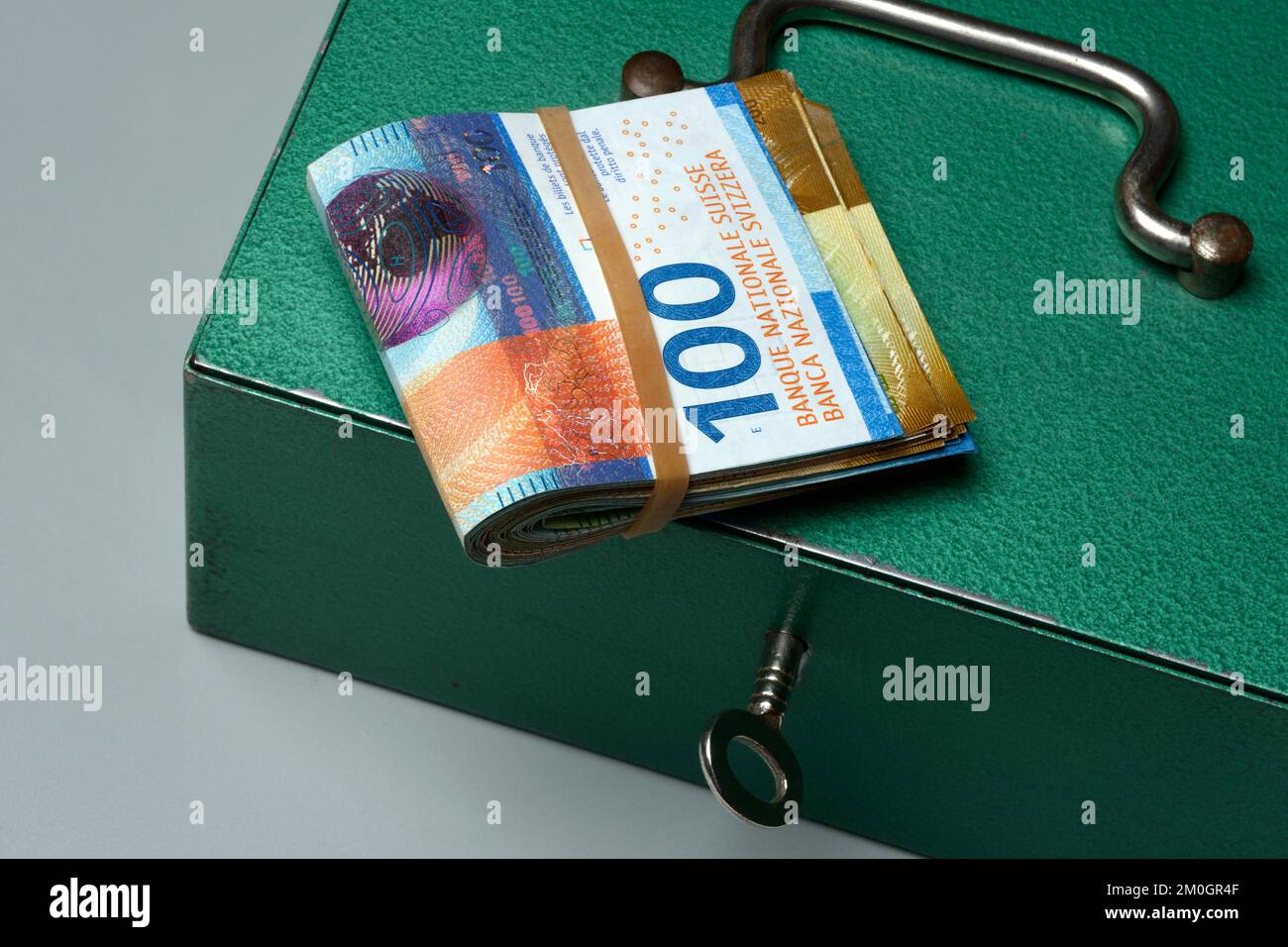 Cash box and Swiss banknotes, money, banknotes Stock Photo