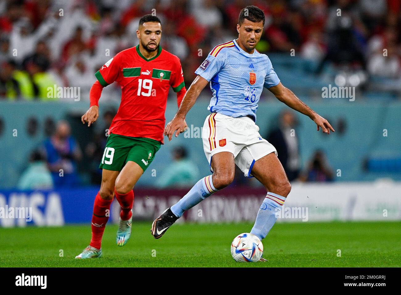 AL RAYYAN, QATAR - DECEMBER 6: Youssef En Nesyri of Morocco and Rodri of Spain during the Round of 16 - FIFA World Cup Qatar 2022 match between Morocco and Spain at the Education City Stadium on December 6, 2022 in Al Rayyan, Qatar (Photo by Pablo Morano/BSR Agency) Stock Photo