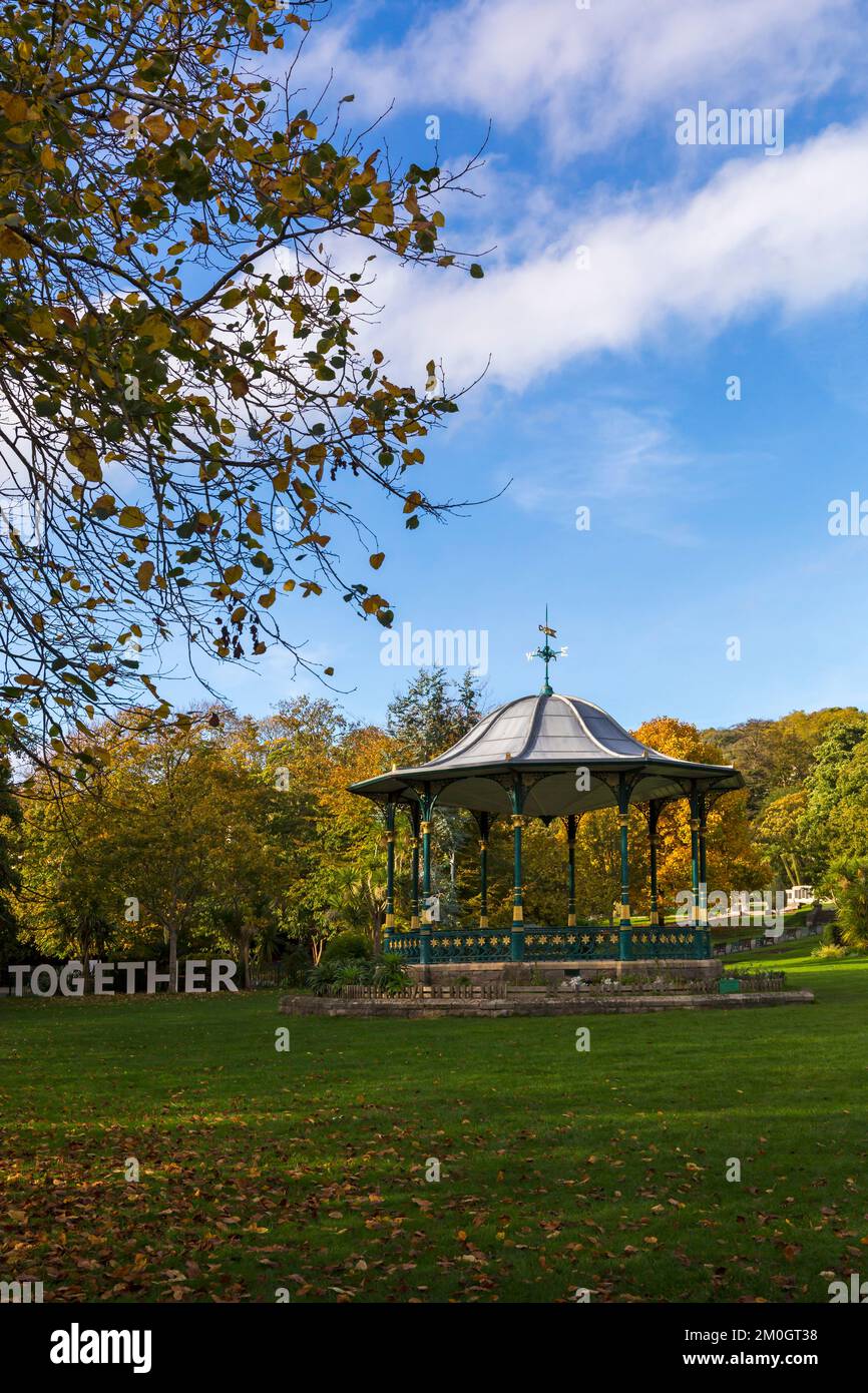 Together in Grove Park municipal park Victorian bandstand at Grove Park