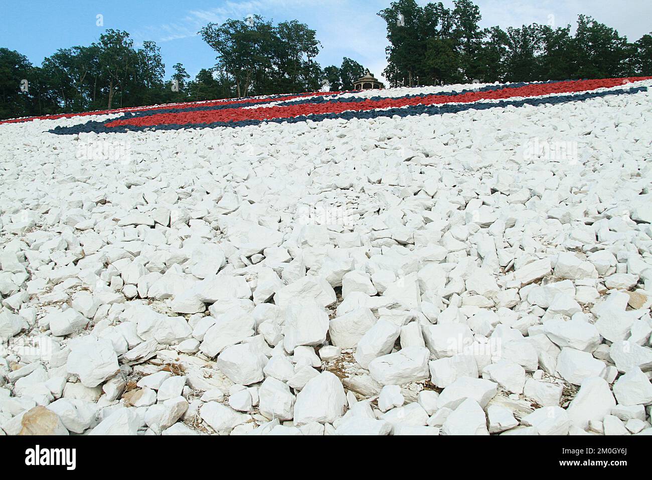 Spraypainted rocks creating a monogram on a hillside Stock Photo Alamy