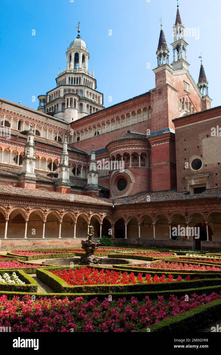 inner-courtyard-decorated-with-planted-flowers-behind-cloister-large