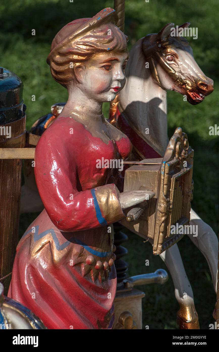 Figures on a nostalgic children's carousel, Bavaria, Germany, Europe Stock Photo