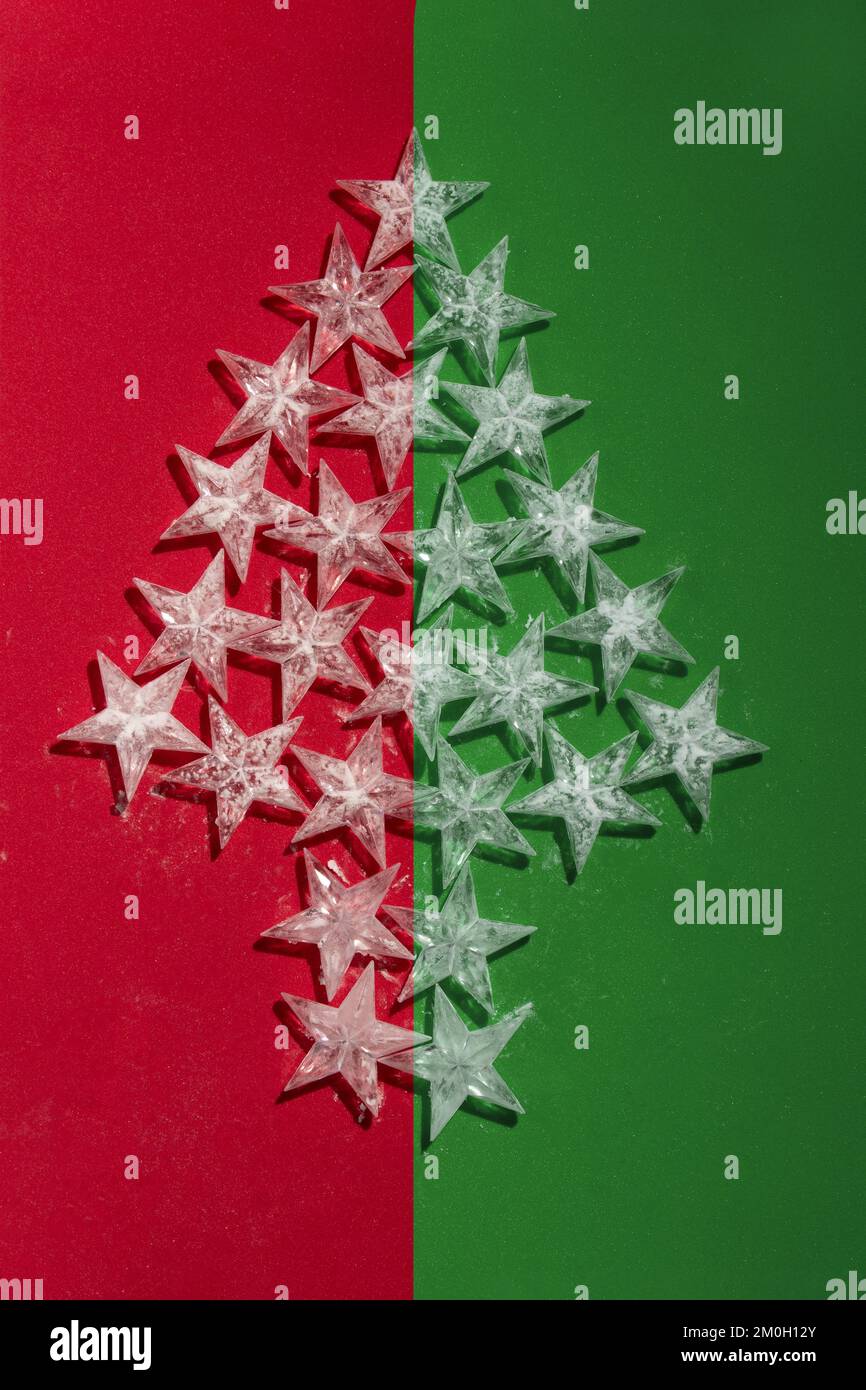 Christmas tree made from stars on red and green background Stock Photo ...