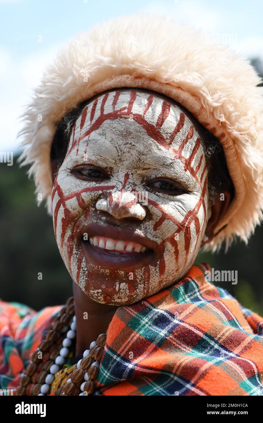 KENYA East Africa Tribal People Kikuyu tribesman wearing head dress and white  body paint decoration Stock Photo - Alamy