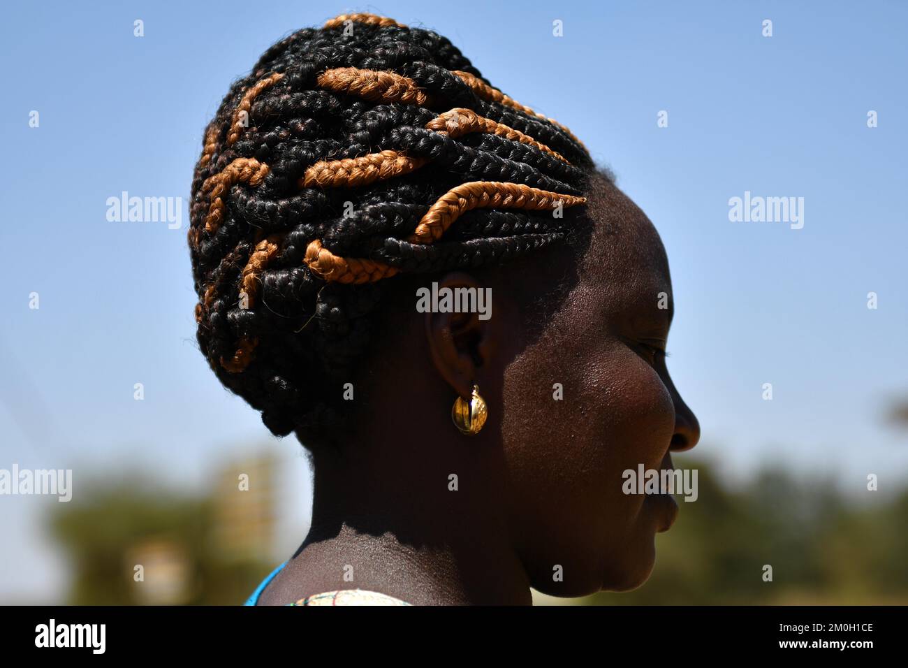 Woman in Kenya with braided hair, Mogotio Stock Photo