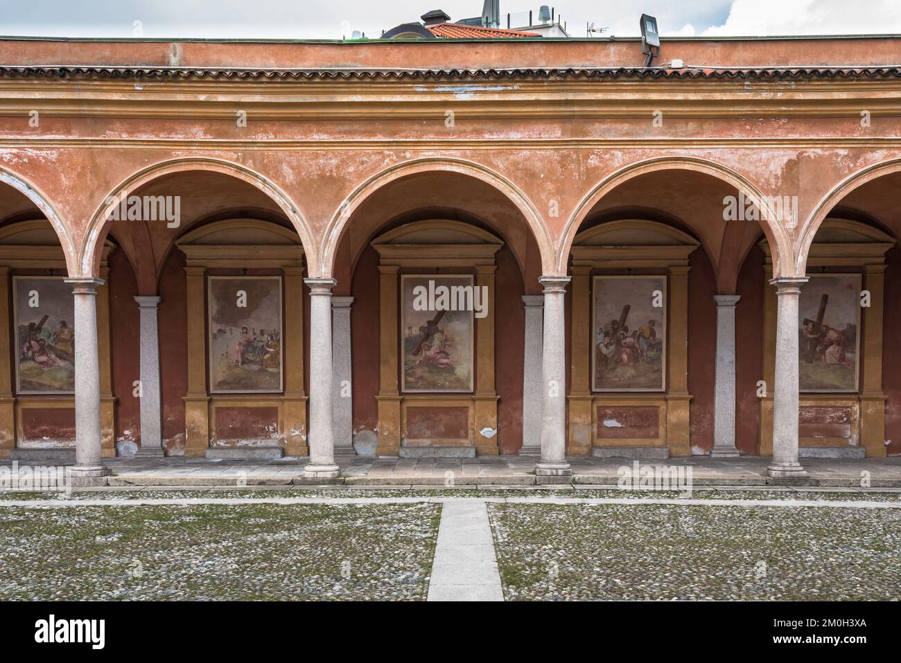 Renaissance arcade, view of a section of the Renaissance era Cloister of the Church of SS Gervasio and Protasio in Baveno, Piedmonte, Italy, Stock Photo